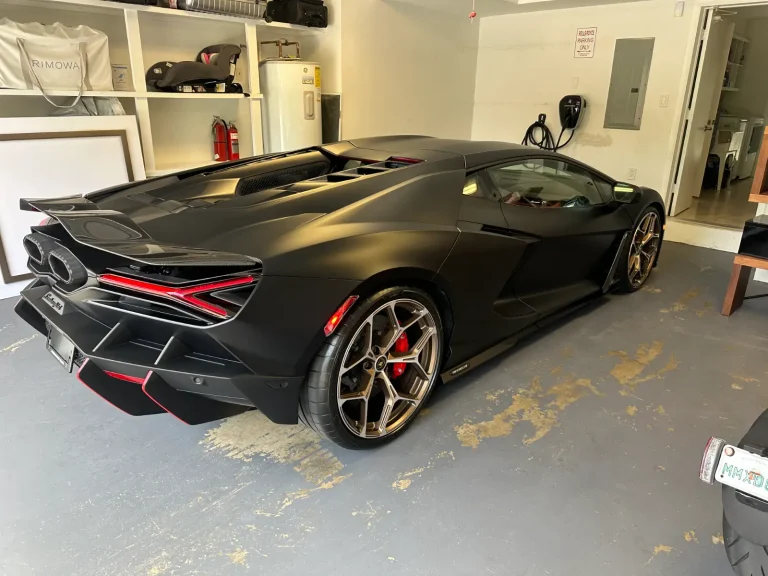 Black Lamborghini Revuelto in garage